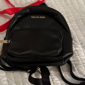 Michael Kors Black Backpack with Gold Details